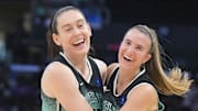Sabrina Ionescu (right) believes her teammate Breanna Stewart (left) deserves a statue at UConn. 