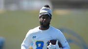 Mike Williams, now reportedly retired, carries the ball during a May workout.