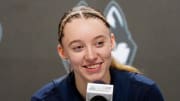 UConn Huskies guard Paige Bueckers during press conference at Rocket Mortgage FieldHouse in 2024.