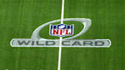 NFL Wild Card playoff logo on the field at SoFi Stadium.