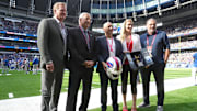 Oct 8, 2023; London United Kingdom; From left: NFL commissioner Roger Goodell, Buffalo Bills owner Terry Pegula, Tottenham Hotspur chairman Daniel Levy, Laura Pegula and Hotspur manager Ange Postecoglou pose during an NFL International Series game at Tottenham Hotspur Stadium. Mandatory Credit: Kirby Lee-Imagn Images