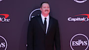 Shane Gillis poses on the ESPYs red carpet at the Dolby Theatre.