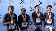 Servite track and field boys' relay team medals at the 2025 Arcadia Invitational.