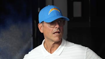 Sep 8, 2024; Inglewood, California, USA; Los Angeles Chargers coach Jim Harbaugh prepares to enter the field before the game against the Las Vegas Raiders at SoFi Stadium. Mandatory Credit: Kirby Lee-Imagn Images
