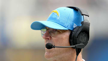 Sep 8, 2024; Inglewood, California, USA; Los Angeles Chargers coach Jim Harbaugh watches from the sidelines in the first half against the Las Vegas Raiders at SoFi Stadium. Mandatory Credit: Kirby Lee-Imagn Images