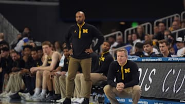 Jan 7, 2025; Los Angeles, California, USA; Michigan Wolverines head coach Dusty May and assistant coach Justin Joyner in the second half against the UCLA Bruins at Pauley Pavilion presented by Wescom. Mandatory Credit: Kirby Lee-Imagn Images