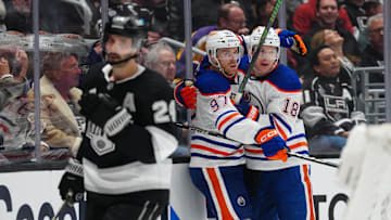 Edmonton Oilers center Connor McDavid (97) and left wing Zach Hyman (18) 