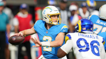 Aug 17, 2024; Inglewood, California, USA; Los Angeles Chargers quarterback Easton Stick (2) throws the ball against the Los Angeles Rams in the first half at SoFi Stadium.