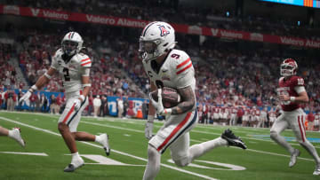Dec 28, 2023; San Antonio, TX, USA; Arizona Wildcats safety Gunner Maldonado (9) carries the ball on a 87-yard fumble recovery for a touchdown against the Oklahoma Sooners in the second half of the Alamo Bowl at Alamodome. Mandatory Credit: Kirby Lee-USA TODAY Sports