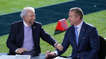 Jan 1, 2024; Pasadena, CA, USA; Lee Corso (left) and Kirk Herbstreit on the ESPN College Gameday set at the 2024 Rose Bowl college football playoff semifinal game at Rose Bowl. Mandatory Credit: Kirby Lee-Imagn Images