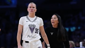 Jun 9, 2025; Los Angeles, California, USA; Golden State Valkyries coach Natalie Nakase (right) talks with guard Julie Vanloo (35) in the first half against the LA Sparks at Crypto.com Arena. Mandatory Credit: Kirby Lee-Imagn Images