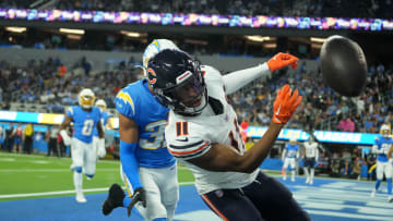 Oct 29, 2023; Inglewood, California, USA;  Chicago Bears wide receiver Darnell Mooney (11) attempts to catch the ball against Los Angeles Chargers safety Alohi Gilman (32) in the second half at SoFi Stadium. Mandatory Credit: Kirby Lee-USA TODAY Sports