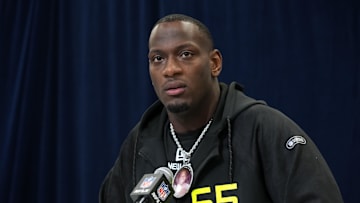Feb 26, 2025; Indianapolis, IN, USA; Texas A&M defensive lineman Nic Scourton (DL65) wears a medallion with picture of late uncle Harold during the 2025 NFL Scouting Combine at the Indiana Convention Center. Mandatory Credit: Kirby Lee-Imagn Images