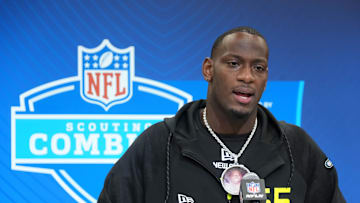 Feb 26, 2025; Indianapolis, IN, USA; Texas A&M defensive lineman Nic Scourton (DL65) wears a medallion with picture of late uncle Harold during the 2025 NFL Scouting Combine at the Indiana Convention Center. Mandatory Credit: Kirby Lee-Imagn Images