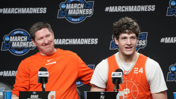 Mar 29, 2024; Los Angeles, CA, USA; Clemson Tigers coach Brad Brownell (left) and center PJ Hall