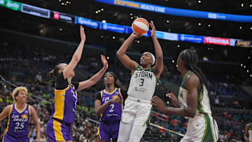 Jul 16, 2024; Los Angeles, California, USA; Seattle Storm forward Nneka Ogwumike (3) shoots the ball against LA Sparks forward Dearica Hamby (5) and LA Sparks forward Rickea Jackson (2) in the second half at Crypto.com Arena. Mandatory Credit: Kirby Lee-Imagn Images