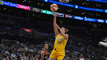 Sep 17, 2024; Los Angeles, California, USA; LA Sparks guard Kia Nurse (10) shoots the ball against the Phoenix Mercury in the second half at Crypto.com Arena. Mandatory Credit: Kirby Lee-Imagn Images