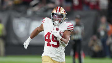 San Francisco 49ers running back Isaac Guerendo (49)