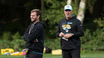 Oct 17, 2024; Watford, United Kingdom; Jacksonville Jaguars offensive coordinator Press Taylor (left) and head coach Doug Pederson watch during practice at The Grove. Mandatory Credit: Kirby Lee-Imagn Images