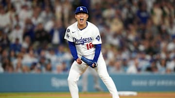 May 20, 2025; Los Angeles, California, USA; Los Angeles Dodgers starting pitcher Yoshinobu Yamamoto (18) celebrates at the end of the seventh inning against the Arizona Diamondbacks at Dodger Stadium. Mandatory Credit: Kirby Lee-Imagn Images