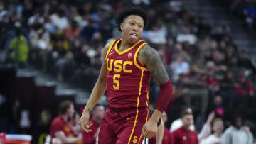 Mar 13, 2024; Las Vegas, NV, USA; Southern California Trojans guard Boogie Ellis (5) reacts after a three-point basket against the Washington Huskies at T-Mobile Arena. Mandatory Credit: Kirby Lee-USA TODAY Sports