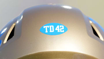 Sep 14, 2024; Pasadena, California, USA; A TD 42 sticker on the helmet of UCLA Bruins offensive lineman Kory Symington (63) in honor of Terry Donahue and Jackie Robinson during the game against the Indiana Hoosiers at Rose Bowl. Mandatory Credit: Kirby Lee-Imagn Images