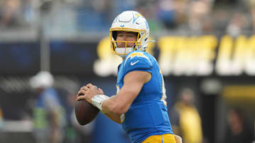 Sep 8, 2024; Inglewood, California, USA; Los Angeles Chargers quarterback Justin Herbert (10) throws the ball against the Las Vegas Raiders in the second half at SoFi Stadium. Mandatory Credit: Kirby Lee-Imagn Images