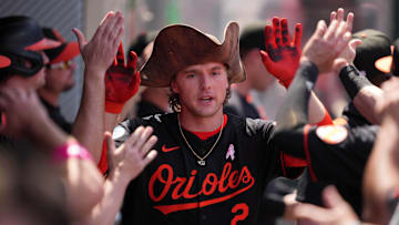 May 11, 2025; Anaheim, California, USA; Baltimore Orioles shortstop Gunnar Henderson (2) is congratulated by teammates after hitting a two-run home run in the sixth inning against the Los Angeles Angels at Angel Stadium. 