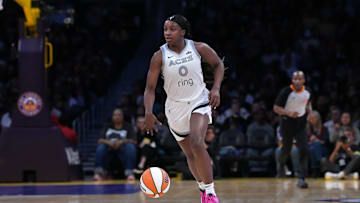 Jul 29, 2025; Los Angeles, California, USA; Las Vegas Aces guard Jackie Young (0) dribbles the ball against the LA Sparks in the second half at the Crypto.com Arena. Mandatory Credit: Kirby Lee-Imagn Images