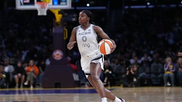 Jul 29, 2025; Los Angeles, California, USA; Las Vegas Aces guard Jackie Young (0) dribbles the ball against the LA Sparks in the second half at the Crypto.com Arena.