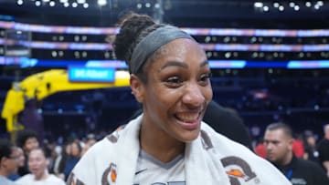 Jul 29, 2025; Los Angeles, California, USA; Las Vegas Aces center A'ja Wilson (22) reacts after the game against the LA Sparks at Crypto.com Arena. Mandatory Credit: Kirby Lee-Imagn Images