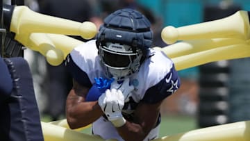 Jul 27, 2025; Oxnard, CA, USA; Dallas Cowboys running back Jaydon Blue (34) carries the ball at training camp at the River Ridge Fields. Mandatory Credit: Kirby Lee-Imagn Images