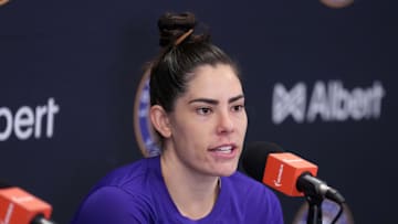 May 25, 2025; Los Angeles, California, USA; LA Sparks guard Kelsey Plum (10) at press conference after the game against the Chicago Sky at Crypto.com Arena. Mandatory Credit: Kirby Lee-Imagn Images