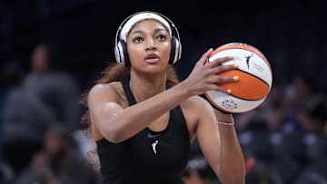 Angel Reese warms up before a game against the Sparks.