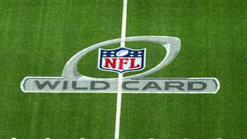 NFL Wild Card playoff logo on the field at SoFi Stadium.