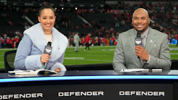 NFL Network broadcasters Kimmi Chex and Steve Smith Sr. pose during an NFL International Series game at Deutsche Bank Park.