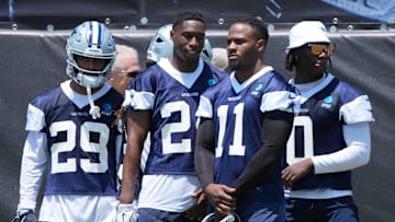Dallas Cowboys players C.J. Goodwin, Israel Mukuamu, Micah Parsons and DeMarvion Overshown during NFL training camp