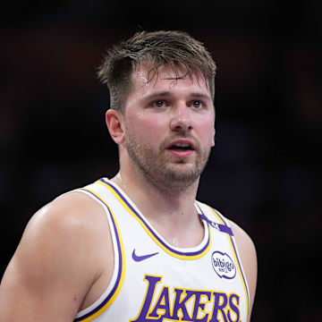 Mar 16, 2025; Los Angeles, California, USA; Los Angeles Lakers guard Luka Doncic (77) reacts against the Phoenix Suns in the second half at Crypto.com Arena. Mandatory Credit: Kirby Lee-Imagn Images
