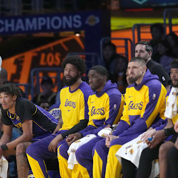 Mar 17, 2025; Los Angeles, California, USA; Los Angeles Lakers forward LeBron James watches from the bench against the San Antonio Spurs in the first half at Crypto.com Arena. Mandatory Credit: Kirby Lee-Imagn Images