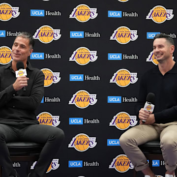 Sep 25, 2024; El Segundo, CA, USA; Los Angeles Lakers general manager Rob Pelinka (left) and coach JJ Redick at press conference at UCLA Health Training Center. Mandatory Credit: Kirby Lee-Imagn Images