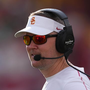Nov 30, 2024; Los Angeles, California, USA; Southern California Trojans head coach Lincoln Riley reacts against the Notre Dame Fighting Irish in the second half at United Airlines Field at Los Angeles Memorial Coliseum. Mandatory Credit: Kirby Lee-Imagn Images