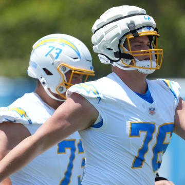 May 29, 2024; Costa Mesa, CA, USA; Los Angeles Chargers offensive tackle Joe Alt (76) wears a Guardian helmet cap during organized team activities at Hoag Performance Center. Mandatory Credit: Kirby Lee-USA TODAY Sports
