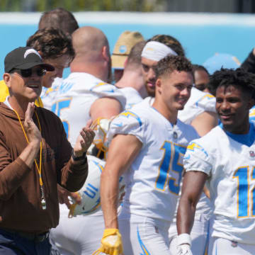 Jun 13, 2024; Costa Mesa, CA, USA; Los Angeles Chargers head coach Jim Harbaugh interacts with his team during minicamp at the Hoag Performance Center.  Mandatory Credit: Kirby Lee-USA TODAY Sports