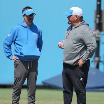 Jun 13, 2024; Costa Mesa, CA, USA; Los Angeles Chargers offensive coordinator Greg Roman (left) and quarterbacks coach Shane Day during minicamp at the Hoag Performance Center. Mandatory Credit: Kirby Lee-Imagn Images