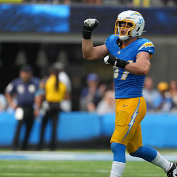 Sep 8, 2024; Inglewood, California, USA; Los Angeles Chargers linebacker Joey Bosa (97) celebrates after a tackle against the Las Vegas Raiders in the first half at SoFi Stadium. Mandatory Credit: Kirby Lee-Imagn Images