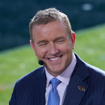College football analyst Kirk Herbstreit thinks an expanded playoff and a better roster could put one Big Ten team in the conversation.