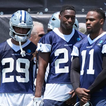 Dallas Cowboys defenders C.J. Goodwin, Israel Mukuamu, Micah Parsons, and DeMarvion Overshown during training camp 
