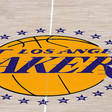 Apr 22, 2023; Los Angeles, California, USA; The Los Angeles Lakers logo at center court during game three of the 2023 NBA playoffs at Crypto.com Arena. Mandatory Credit: Kirby Lee-Imagn Images