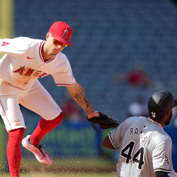 Sep 18, 2024; Anaheim, California, USA; Los Angeles Angels shortstop Zach Neto (9) tags out Chicago White Sox third baseman Bryan Ramos (44) out at second base in the 10th inning at Angel Stadium. Mandatory Credit: Kirby Lee-Imagn Images