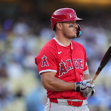Mar 23, 2025; Los Angeles, California, USA; Los Angeles Angels outfielder Mike Trout (27) reacts in the first inning against the Los Angeles Dodgers at Dodger Stadium. Mandatory Credit: Kirby Lee-Imagn Images